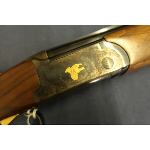 512 - Cased Rottweil 28 bore over and under ejector shotgun with 30 inch barrels, multi chokes, with singl... 