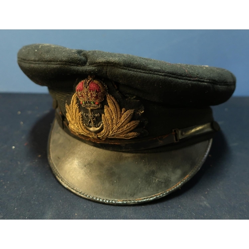 199 - British Naval peaked cap with embroidered badge