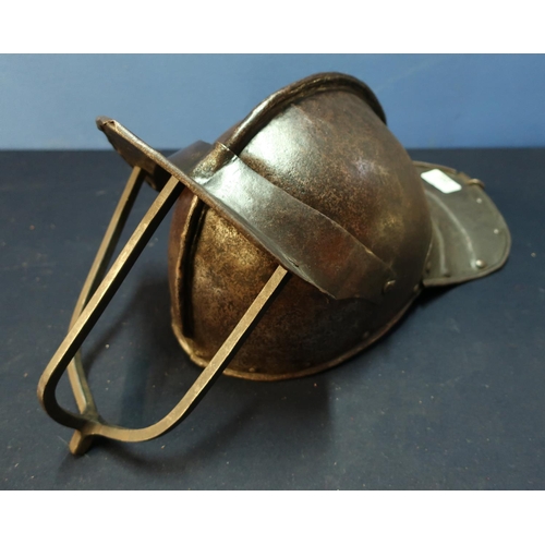 202 - 17th C English Civil War period lobster tail helmet with raised comb and peaked three bar visor