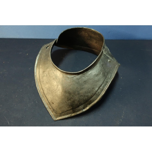 203 - 17th C steel Gorget/neck armour with left hand hinged pivot