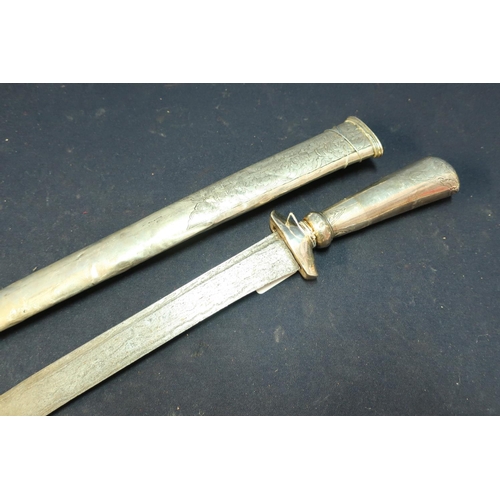 226 - 19th C white metal Malaysian Kris style sword with 19 3/4 inch tapering blade, with an Eastern white... 