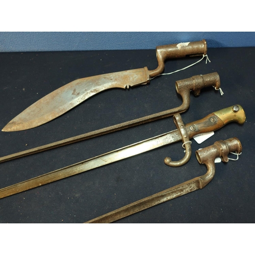 276 - Group of four assorted bayonets including two 19th C steel socket triangular form bayonets, circa WW... 