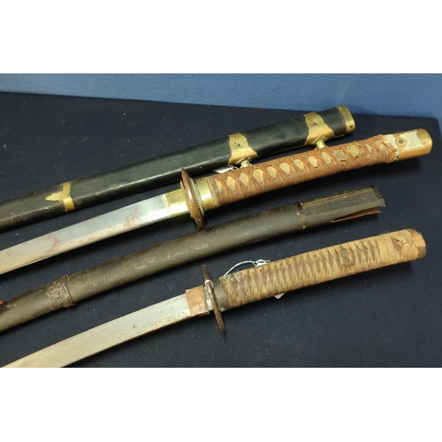 283 - Japanese short sword with 17 inch blade, iron Tsuba and complete with sheath, and another large Japa... 