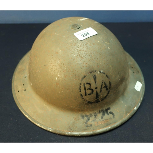 295 - British WWII period steel helmet with impressed mark BA 2225 complete with liner and chin strap. the... 