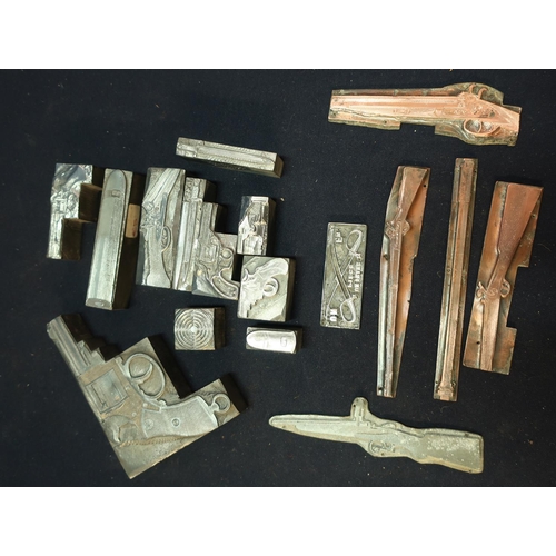 301 - Three boxes containing sixteen 19th C metal gun and military related printing blocks for pistols, ri... 