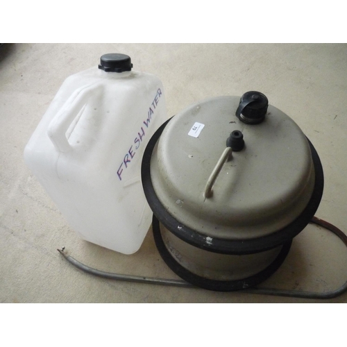 100 - Aqua Roll water carrier and a fresh water jerry can