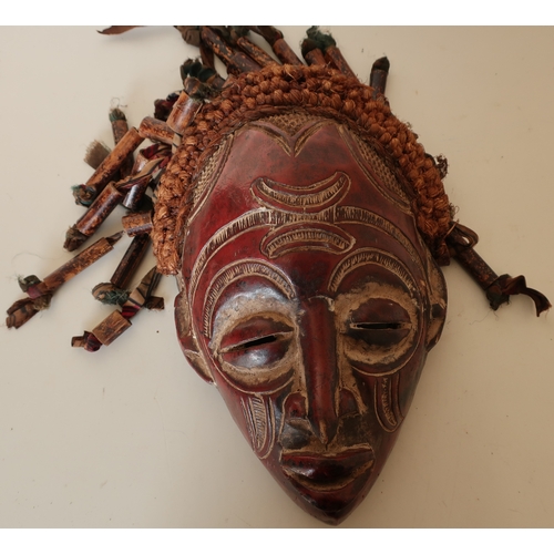 90 - Large carved African style carved tribal face mask with highlighted detail, hessian ropework, ribbon... 