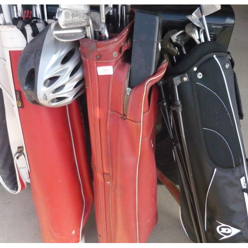 103 - Three sets of golf clubs in bags