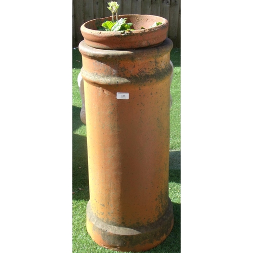 135 - Large vintage terracotta chimney pot with a planter and plants