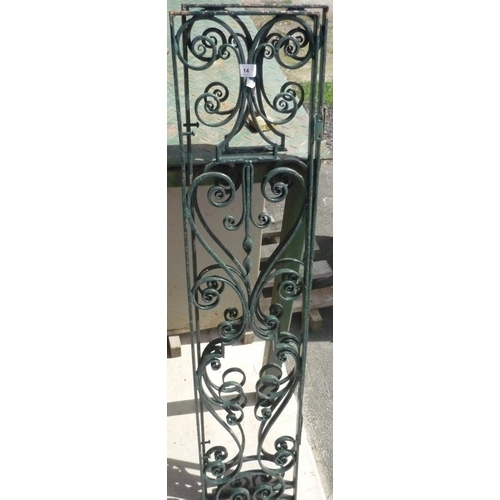 14 - Two hinged ornate wrought iron panels