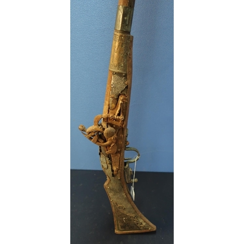 236 - 19th C Arabian flintlock Musket with white metal and brass overlay and inlaid detail, with 50 inch b... 