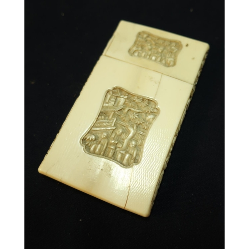 38 - Late 19th C Chinese carved ivory cardcase with four panels and scrollwork detail to the borders (9.5... 