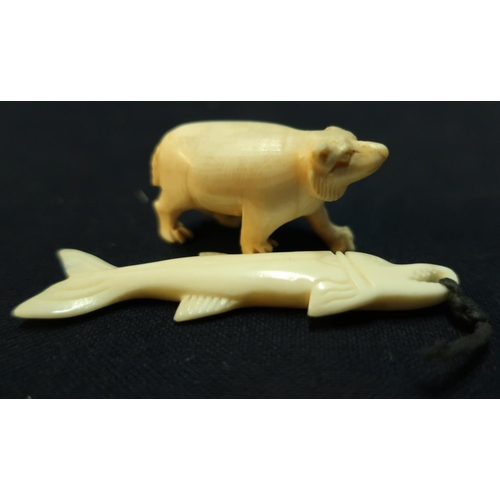 42 - Early 20th C carved ivory figure of a bear, and another of a fish (2)