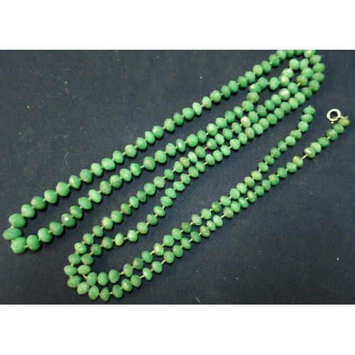 45 - Extremely long 19th/20th C hand knotted green hardstone necklace (overall length 140cm)