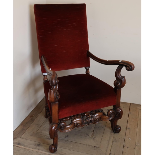 226 - Elaborate mahogany framed armchair with upholstered seat and back