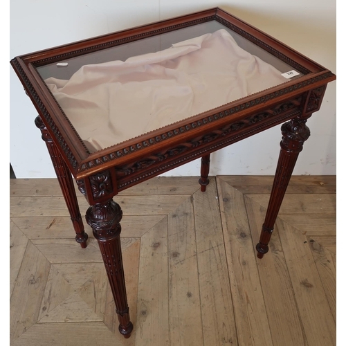 227 - Mahogany rectangular bijouterie cabinet with lift up glazed top on carved and fluted supports (59cm ... 