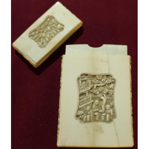 38 - Late 19th C Chinese carved ivory cardcase with four panels and scrollwork detail to the borders (9.5... 