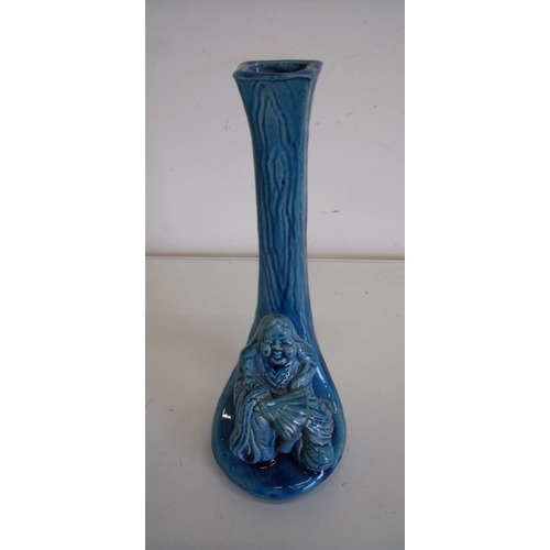 191 - Early 20th C Studio ware stem vase mounted with a figure of a Buddha type deity (height 20cm)