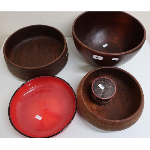 501 - Three turned wood bowls, another red glass bowl and a Eastern style pot (5)