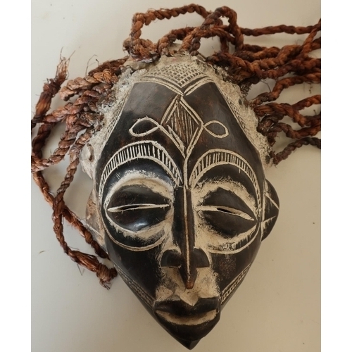 502 - African tribal carved wood mask with hessian stringwork hair