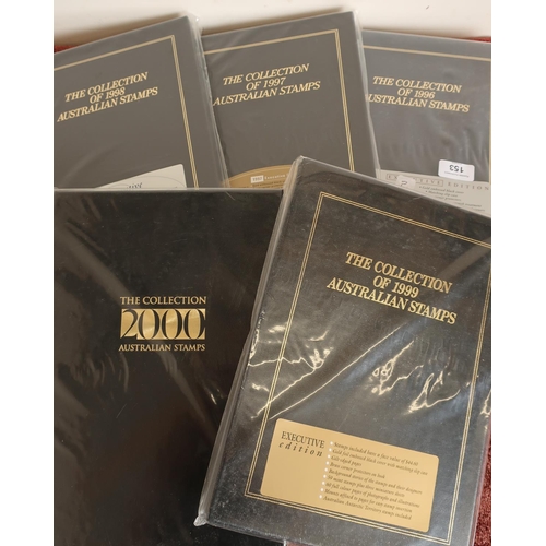 153 - Five Australian executive black leather postage yearbooks 1996 - 2000 with mint stamps unopened as d... 