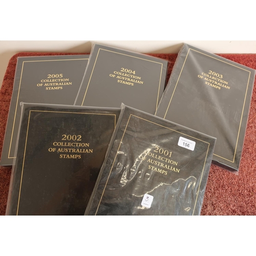 156 - Five Australian executive black leather postage yearbooks 2001 - 2005 with mint stamps unopened as d... 