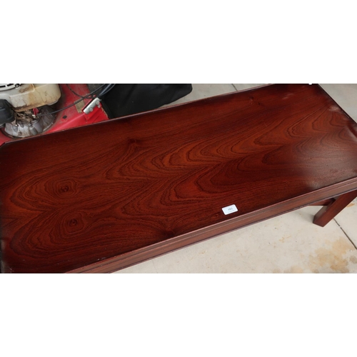 483 - Mahogany finish rectangular coffee table with X shaped under stretcher