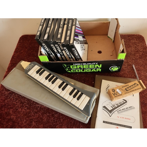 54 - Boxed Hohner mouth piece, a Hohner Melodica Piano 26, various booklets, professional studio recordin... 