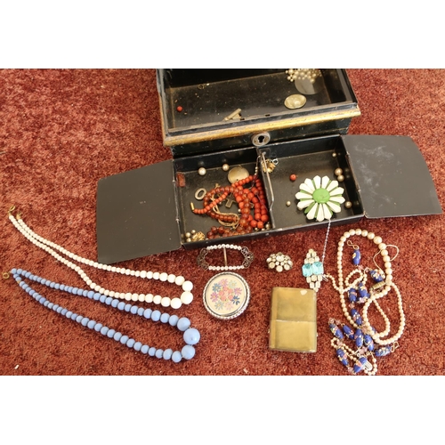 76 - Japped metal cash box containing a selection of various assorted costume jewellery