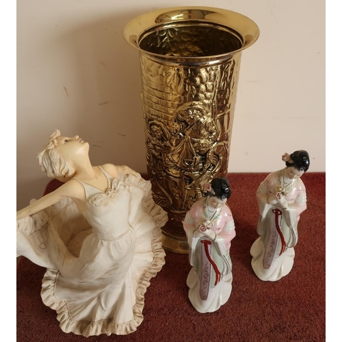 46 - Pressed brass stick stand and three decorative figures