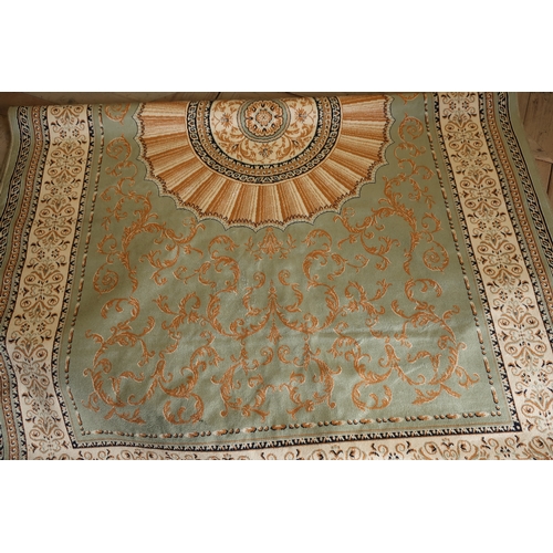 332 - Green ground Abusson carpet (230cm x 160cm)