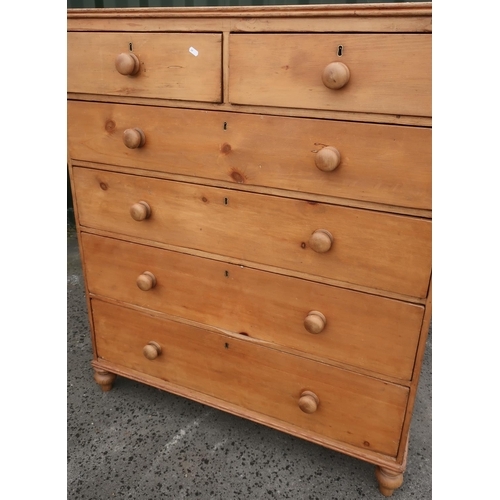 106 - Large Victorian pine chest of two short above four long drawers on turned supports (111cm x 51cm x 1... 