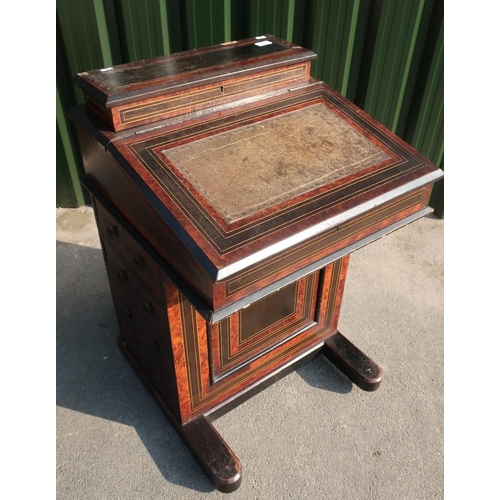 115 - Victorian walnut and ebonised Davenport with lift up top revealing fitted interior above slope front... 