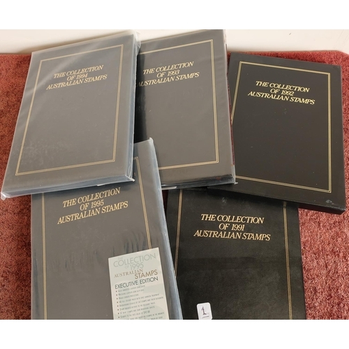 152 - Five Austalian executive black leather postage yearbooks 1991 - 1995, two with mint stamps inserted,... 