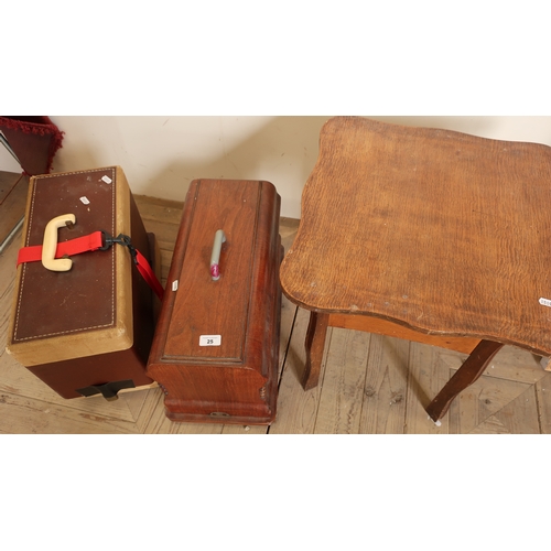 25 - Wooden cased vintage sewing machine, another later sewing machine and an oak sewing table (3)