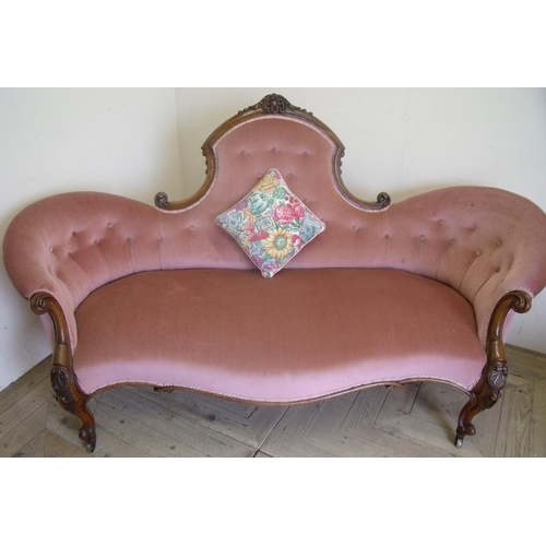 544 - Victorian walnut framed three seat settee with upholstered seat and buttoned back, with carved suppo... 