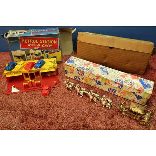 107 - Box for a Britains 155mm field gun, a boxed Coronation Stage Coach and a boxed petrol station & four... 