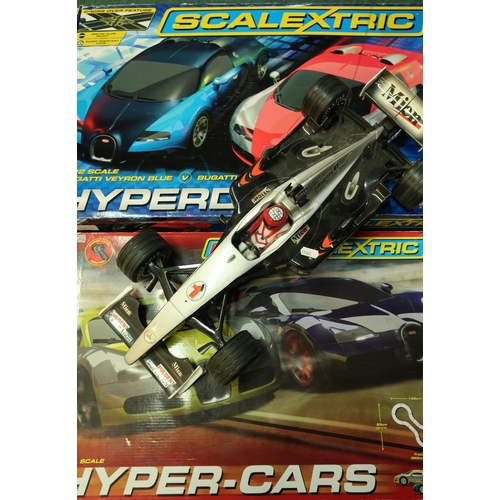 231 - Boxed Micro Scale Hyper Cars Racing Set, boxed Scalextric Hyper Drive Set and a remote control F1 ty... 