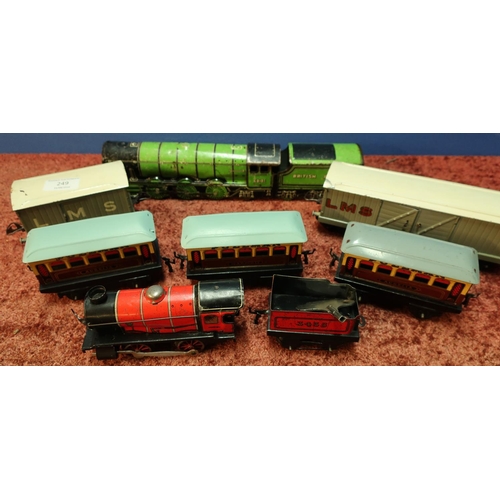 249 - Selection of Hornby O gauge rolling stock including LMS goods wagons, early tin-plate Pullman coache... 