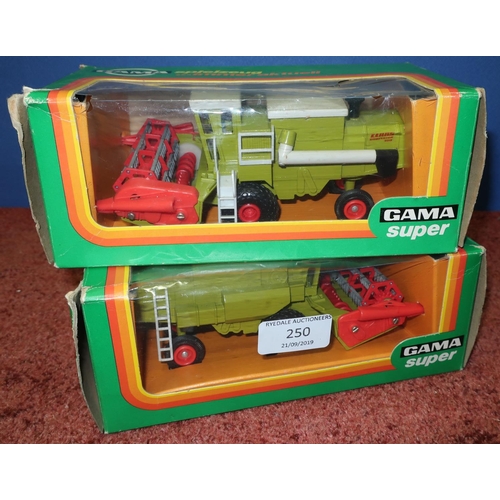 250 - Two boxed Gama Super combine harvesters