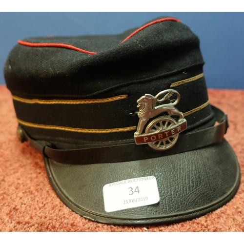 34 - Railway peaked hat with Porters white metal and enamel cap badge