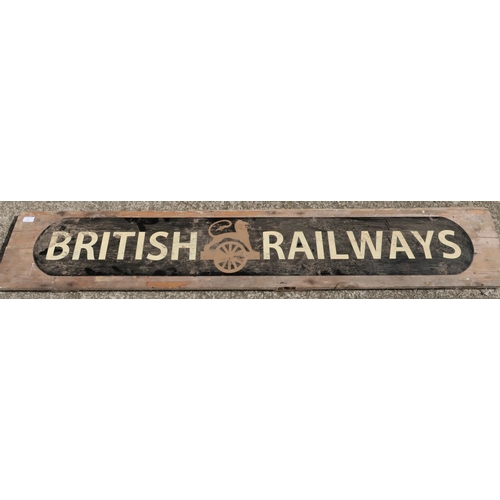 71 - Wooden board mounted with enamel sign with painted British Railways detail (width 169cm)