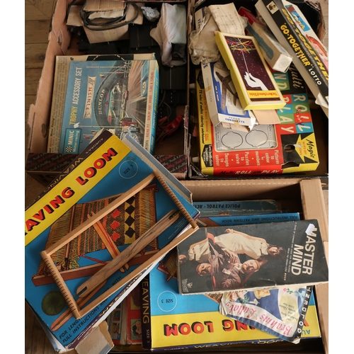 256 - Selection of various vintage board games, Minic Trophy Accessory Car Racing Set etc in three boxes