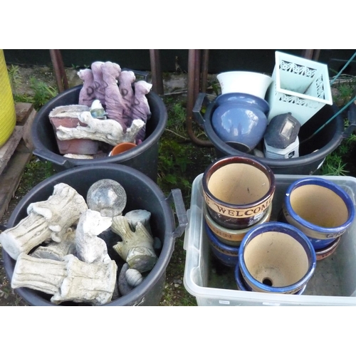 172 - Four plastic buckets containing various garden ornaments including meerkats, birds, cats and pots