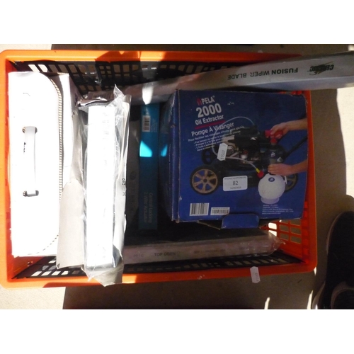 82 - Box containing a Pela 2000 oil extractor pump, some heavy duty jump leads, windscreen wipers and oth... 