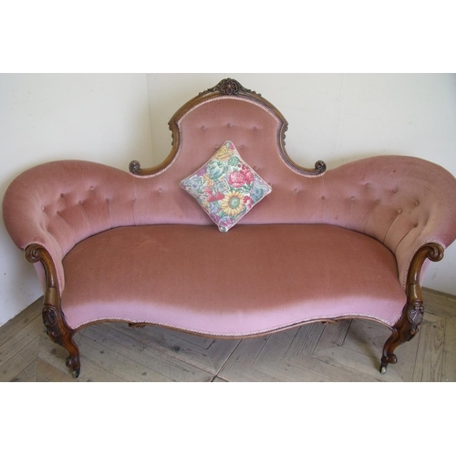 102 - Victorian walnut framed three seat settee with upholstered seat and buttoned back, with carved suppo... 