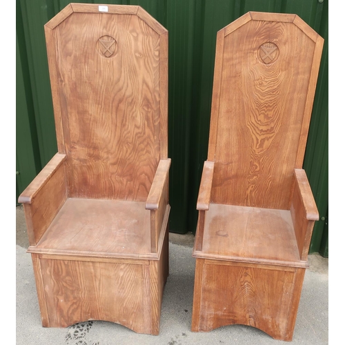 236 - Pair of modern Medieval style Baronial throne type chairs with carved shield crest detail to the bac... 