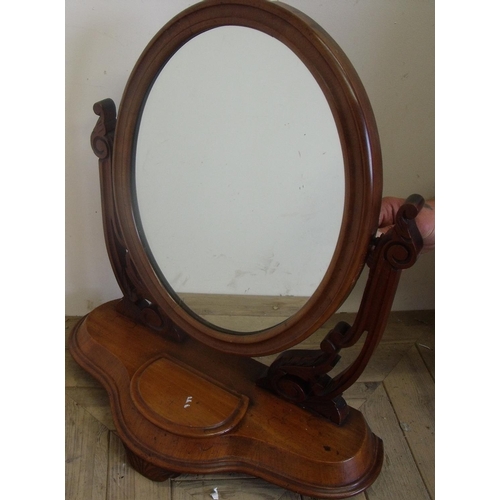 237 - Victorian mahogany oval dressing table mirror on raised base with compartments