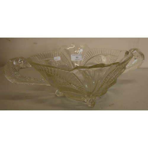 29 - A mid 20th C molded glass center piece with twin dolphin handles, attributed to BROCHWITZ by Frederi... 