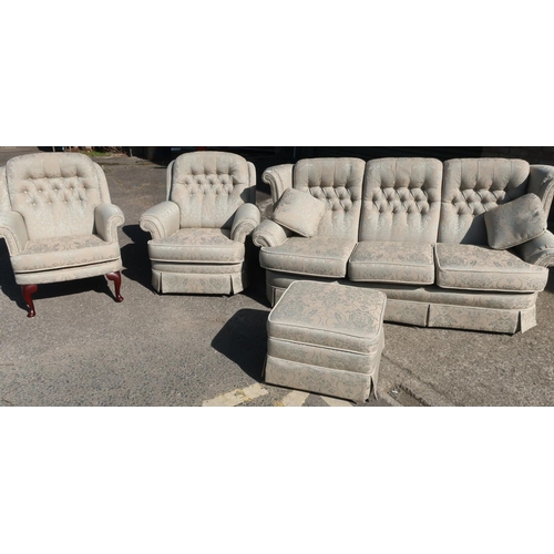 100 - Four piece suite comprising of three seat wing back sofa, wing back armchair, a reclining armchair a... 